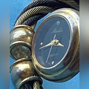 Gold and Black  vintage clamp watch from Moulin